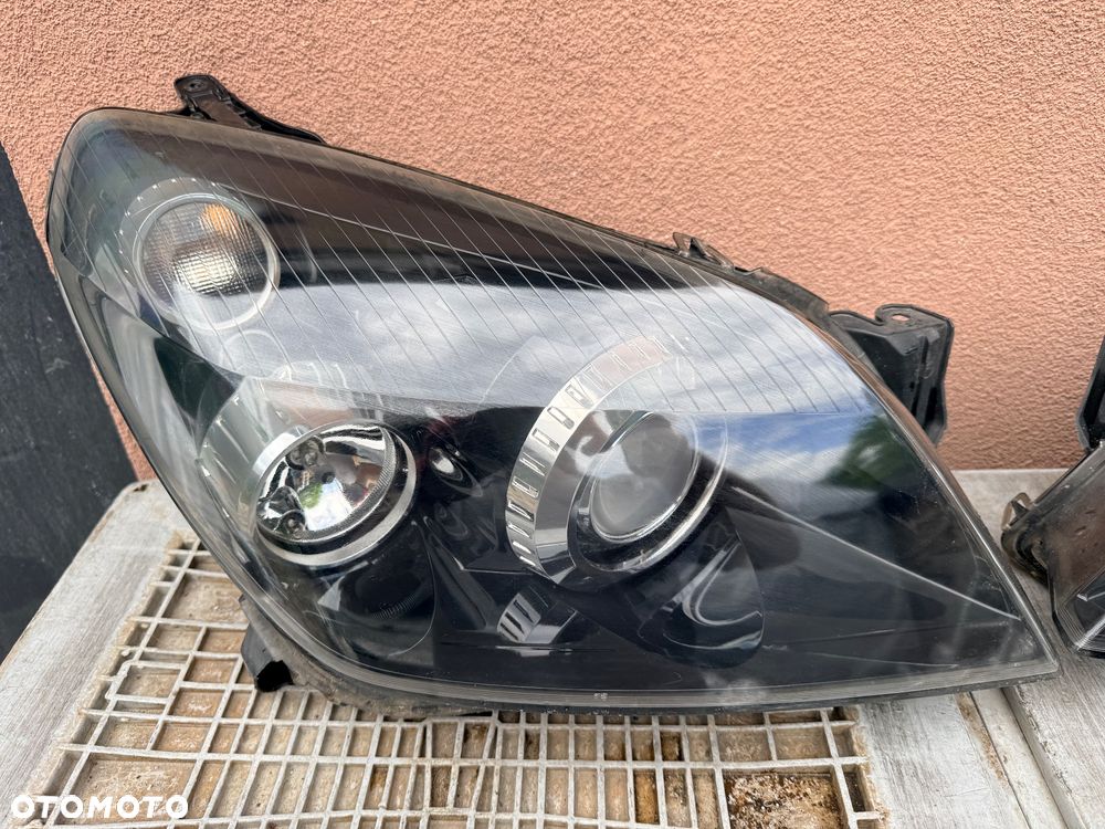 Lampa przednia OPEL ASTRA H XENON NIESKRĘTNE KOMPLET EUROPA HELLA Z 1 AUTA - 2