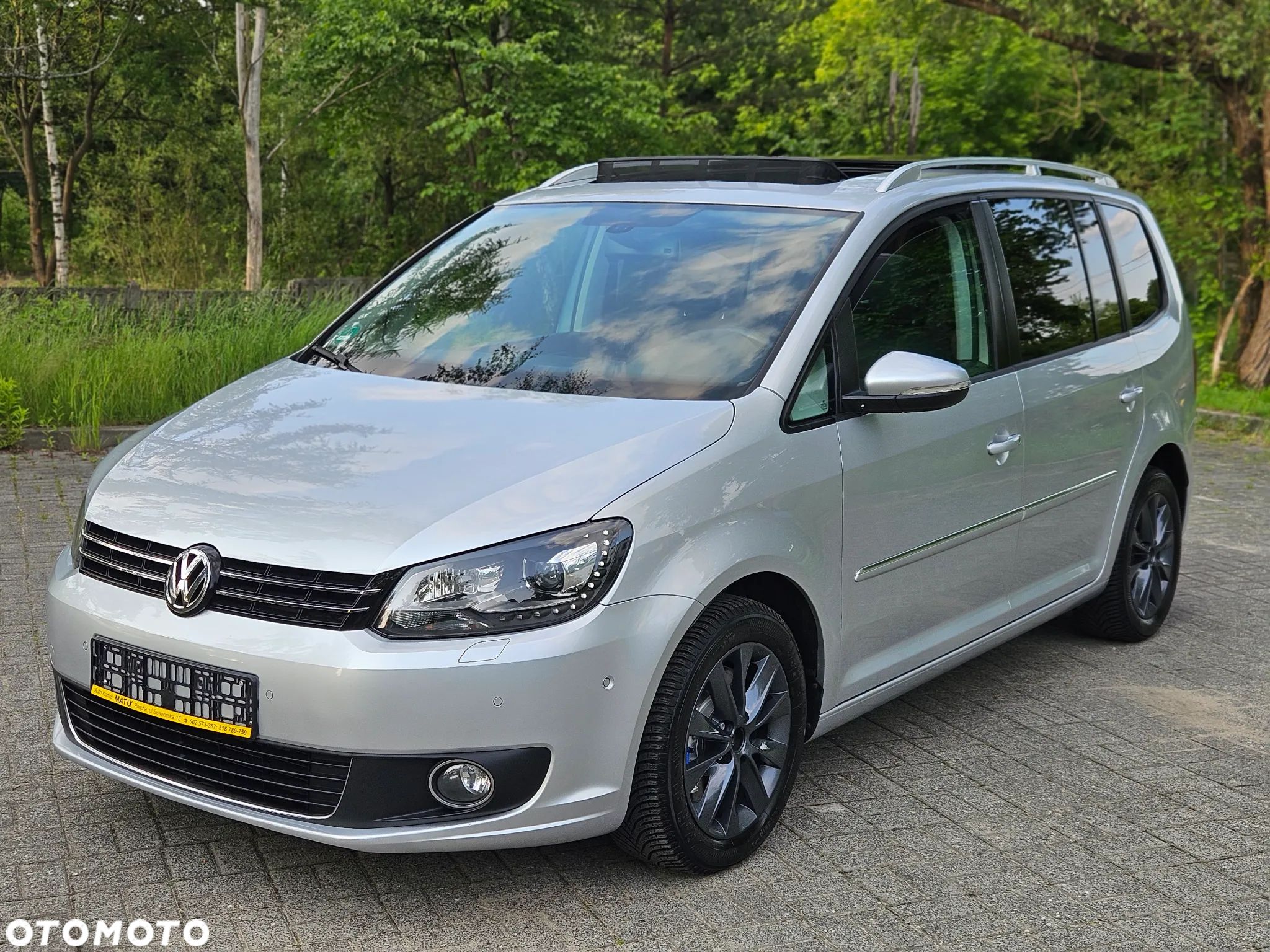 Volkswagen Touran 1.4 TSI Cross DSG - 1