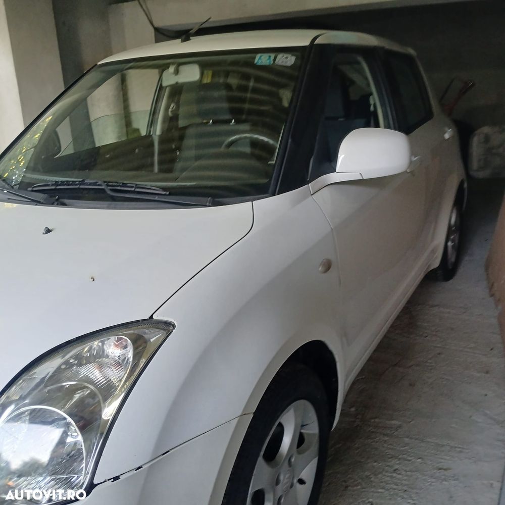 Suzuki Swift 1.3 Club - 6