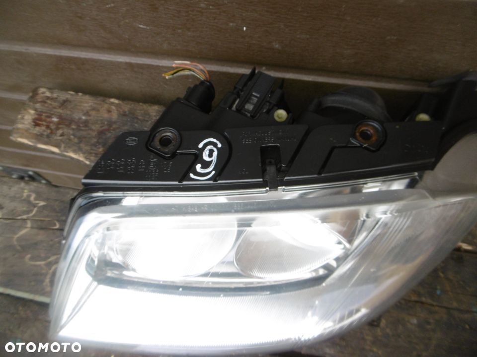 Lampa lewa VW PASSAT B5 LIFT HELLA EUROPA - 3