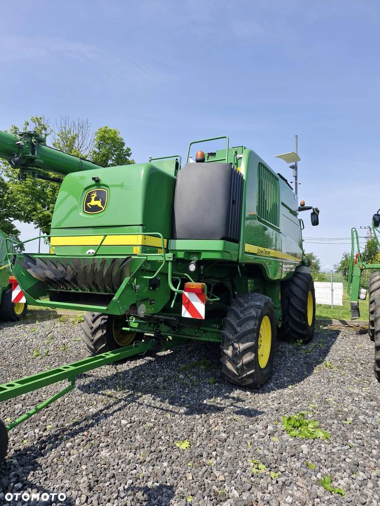 John Deere T560 - 7