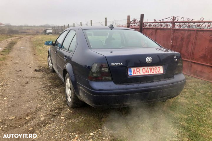 Far stanga Volkswagen VW Bora 1  [din 1998 pana  2005] seria Sedan 1.6 MT (100 hp) - 4