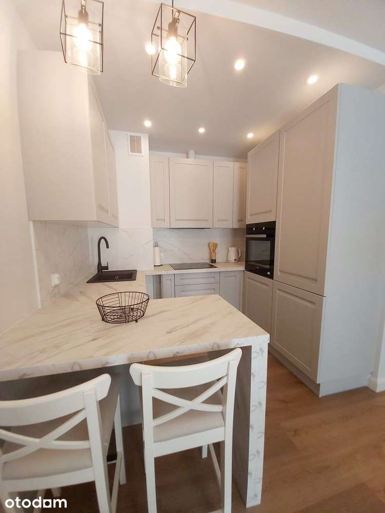 Komfortowy apartament z balkonem i garażem