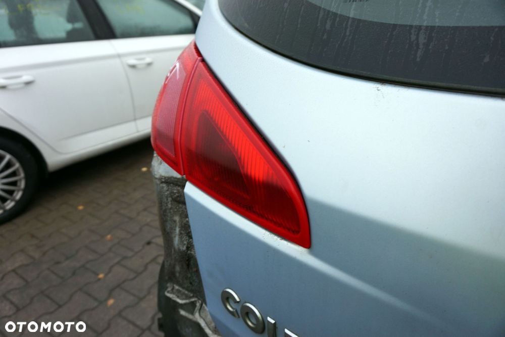 LAMPA TYLNA PRAWA KLAPY BAGAŻNIKA COLT VI Z30 3D HB MN186274 MITSUBISHI 2004-2008 - 1