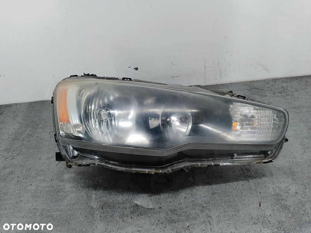 LAMPA PRZÓD PRAWA MITSUBISHI LANCER IX P6117 P6118 - 1