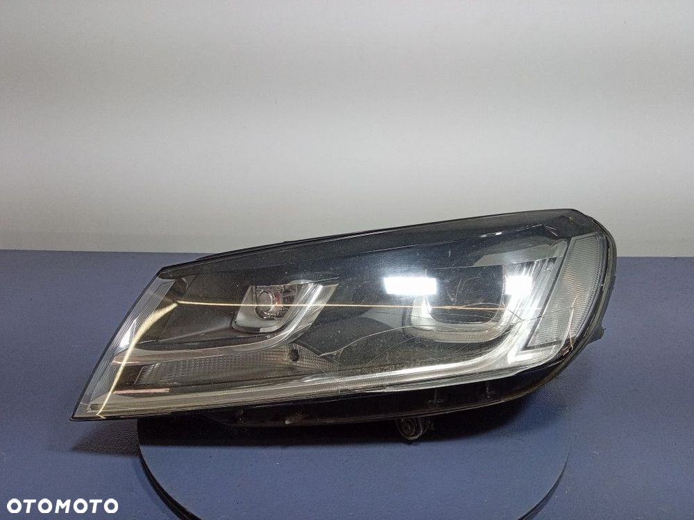 VW TOUAREG II 7P LIFT REFLEKTOR LEWY BIXENON SKRĘTNY EU 7P1941033A - 1