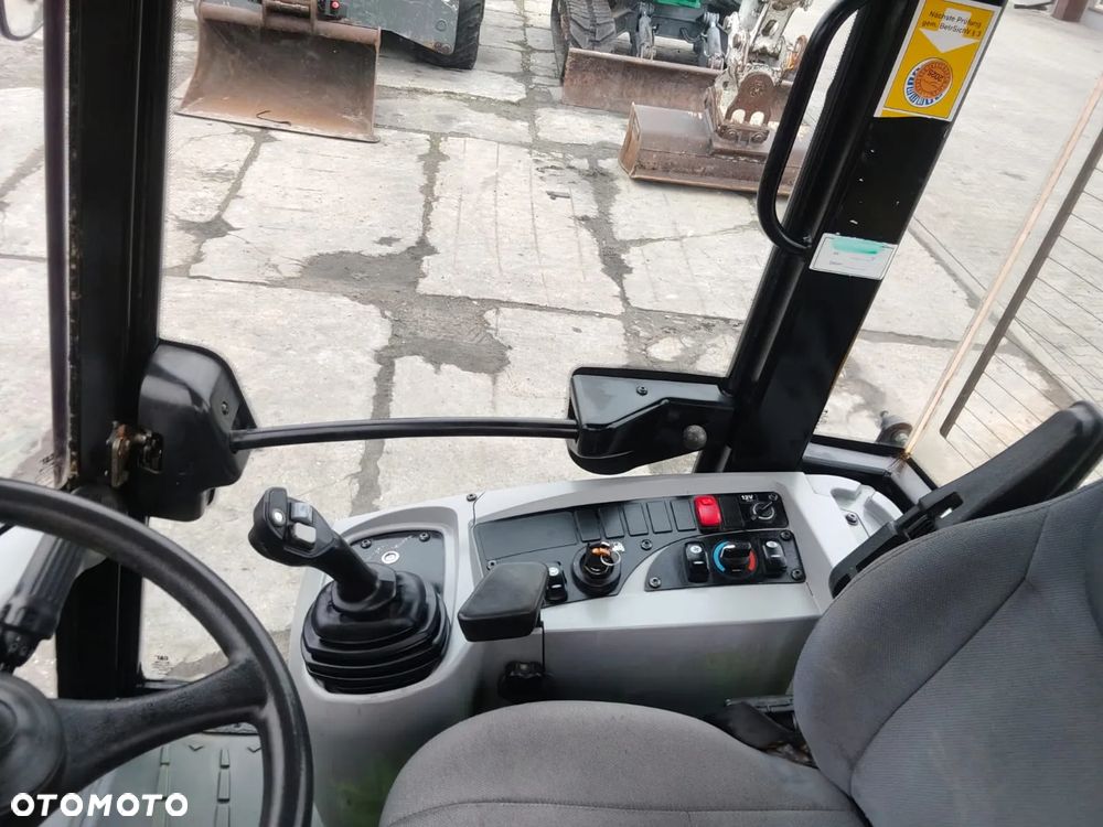 Caterpillar 907H - 7