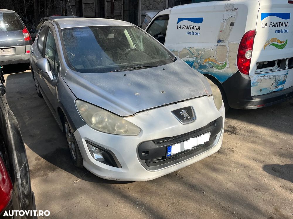 Dezmembrez Peugeot 308 hatchback 2012 1,6HDI facelift gri argintiu - 1