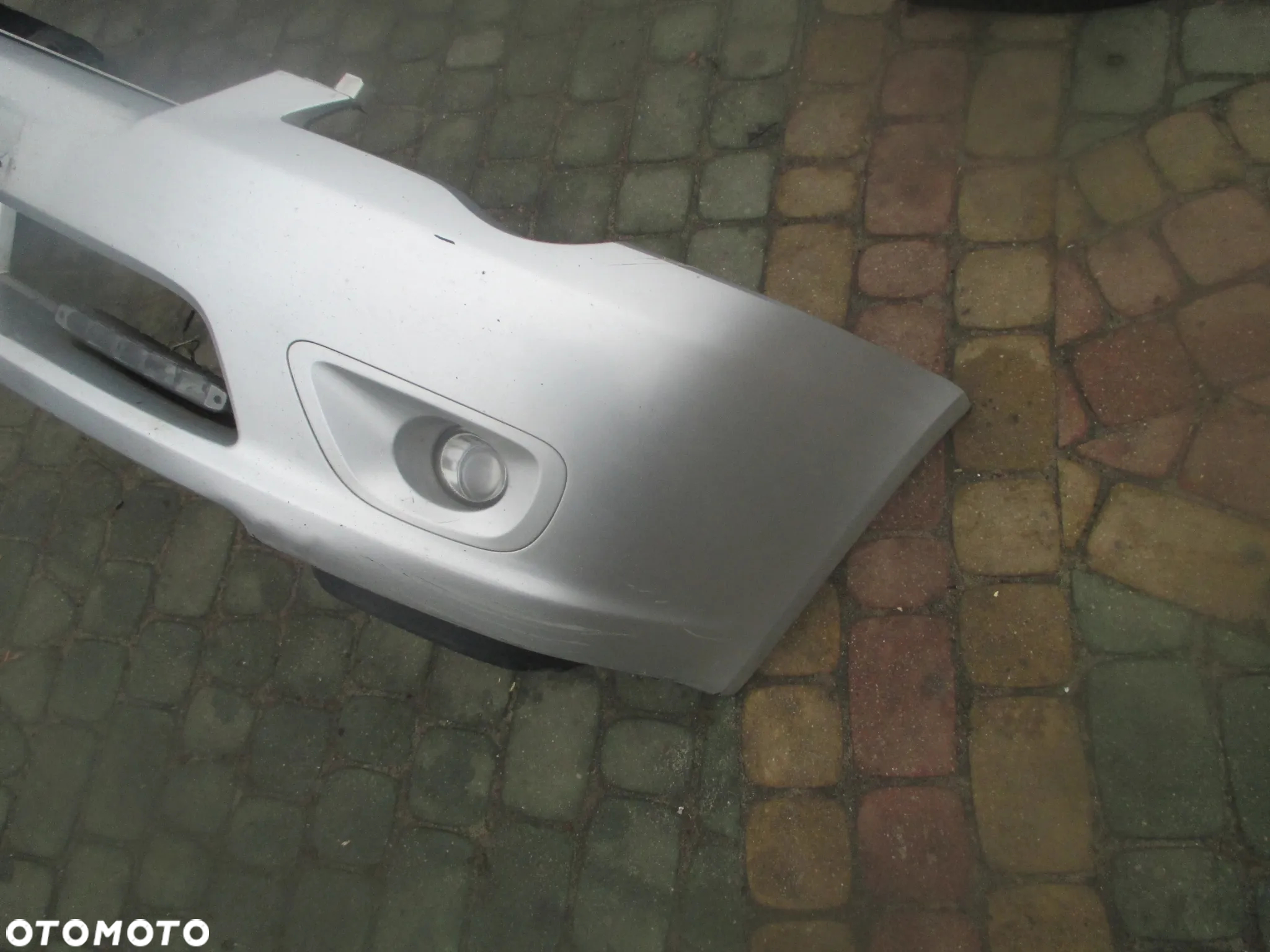 Zderzak przód Subaru Legacy IV 03-06 57704AG000 - 2