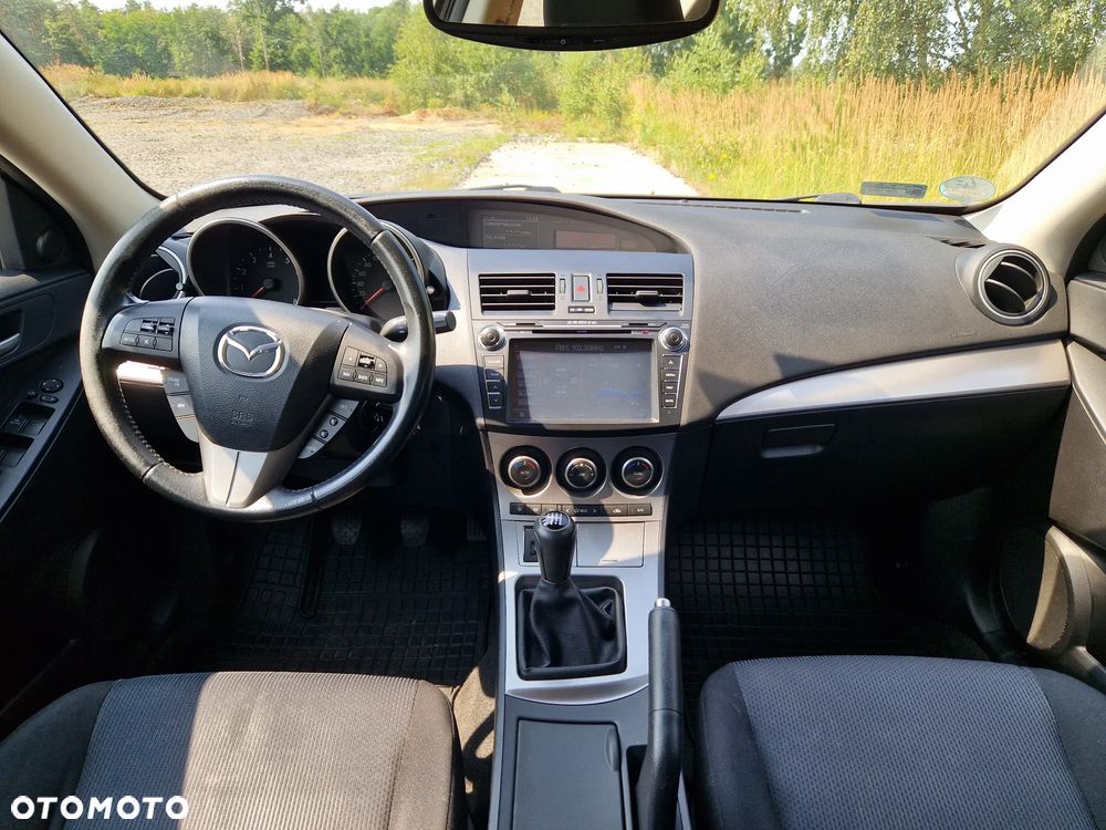 Mazda 3 2.0 Exclusive + - 12