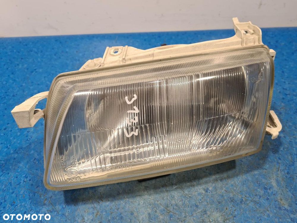 OPEL ASTRA F LIFT REFLEKTOR LEWY - 1