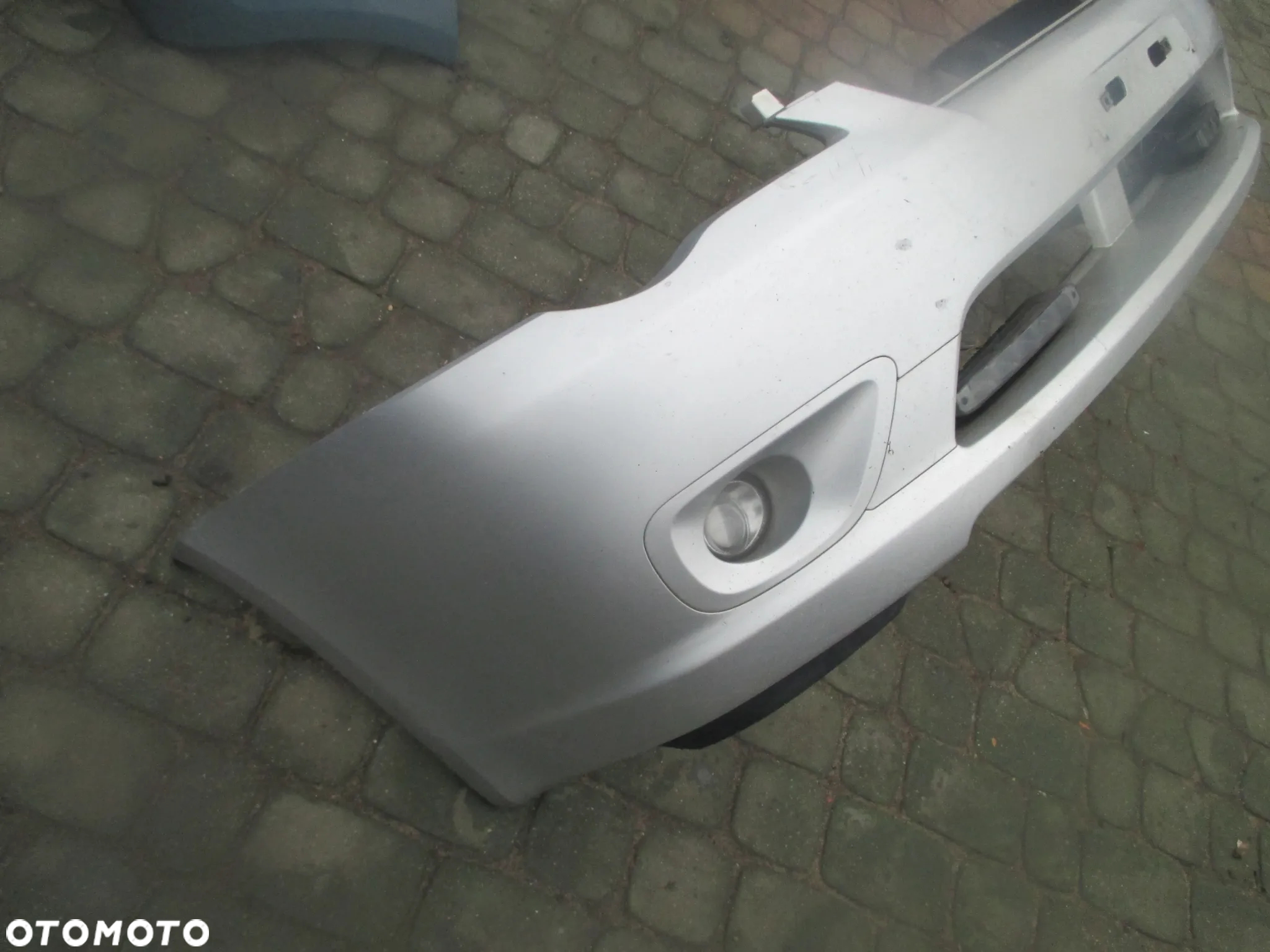 Zderzak przód Subaru Legacy IV 03-06 57704AG000 - 3