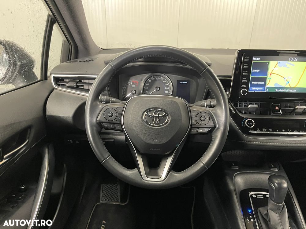 Toyota Corolla 2.0 HSD Exclusive - 6