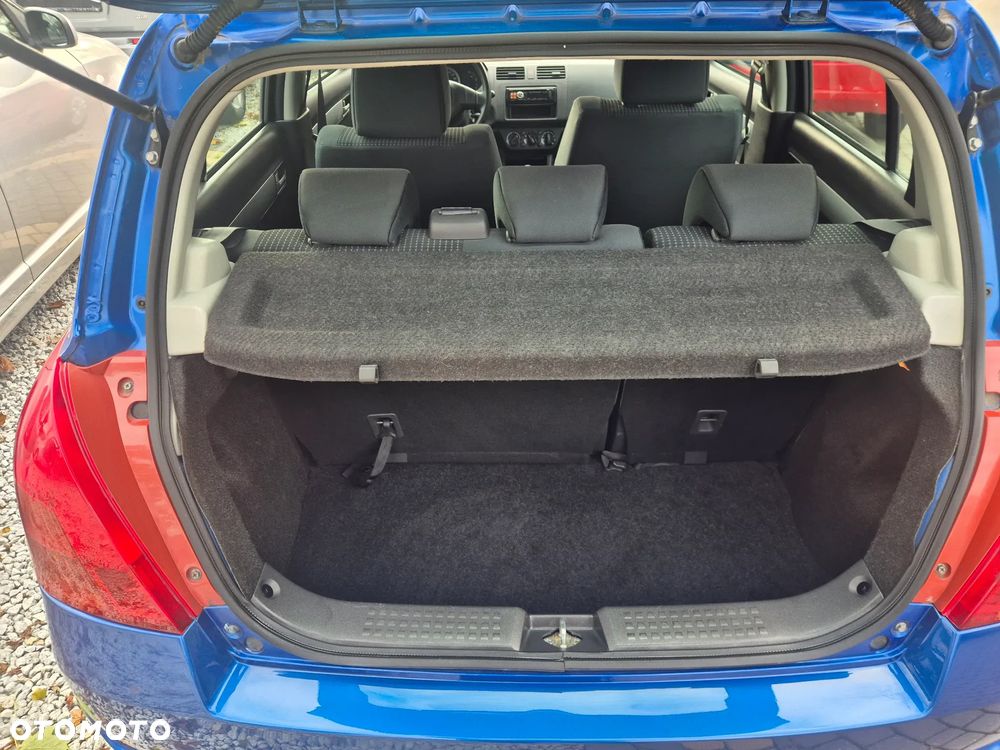 Suzuki Swift 1.3 Club - 8