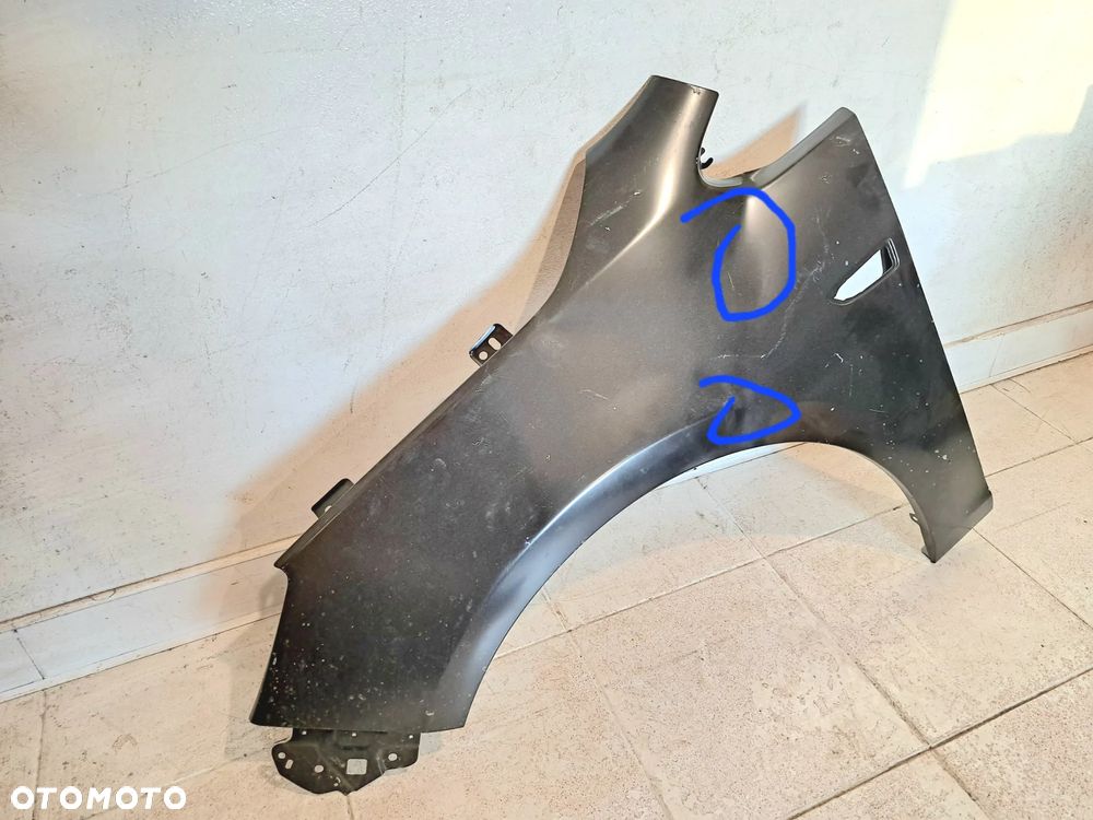 BŁOTNIK LEWY PRZÓD PRZEDNI OPEL ASTRA J 4 IV - 2