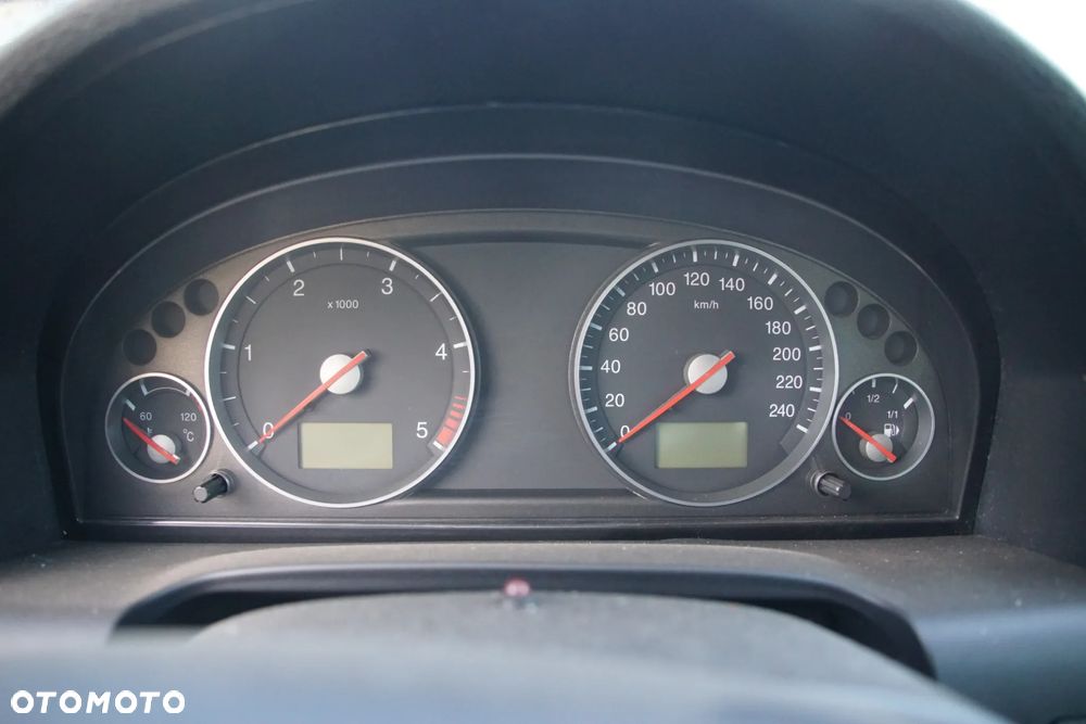Auto na części - Ford Mondeo MK3 Lift 2.0 TDCI 130 KM 4S7Q-6006-EA 5S7R-7002-CA 2MWE 2005R Silnik Skrzynia Drzwi Maska Klapa Zderzak Błotnik Szyba Lusterko Deska Kokpit Sterownik Moduł Czujnik Licznik Kierownica Panel - 12
