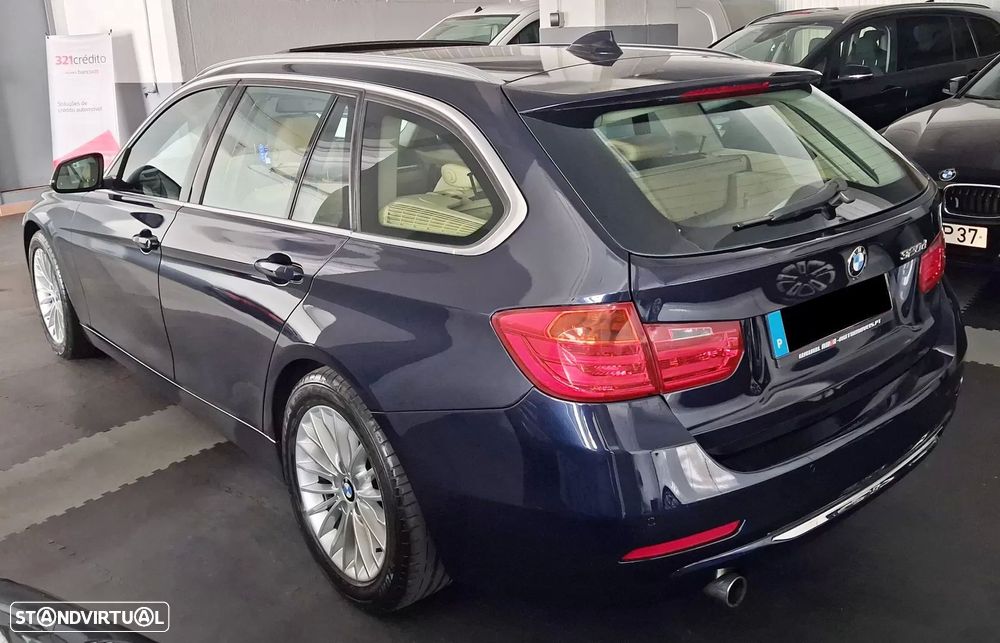 BMW 320 d Auto Exclusive - 4