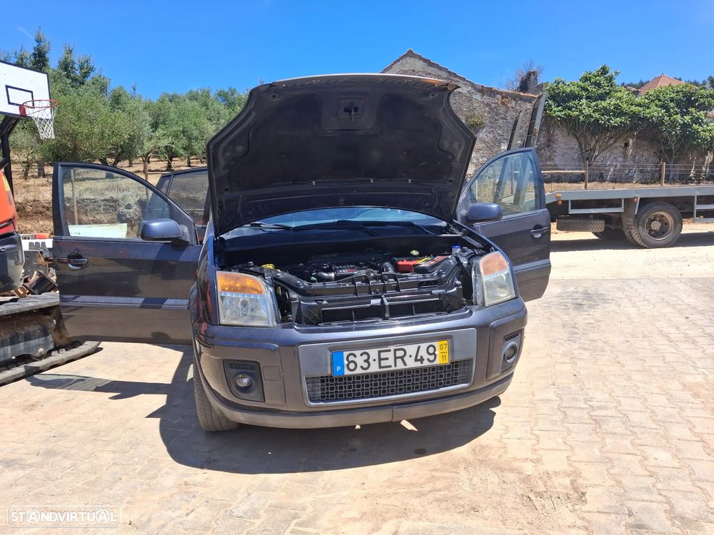 Ford Fusion 1.4 TDCI + - 12