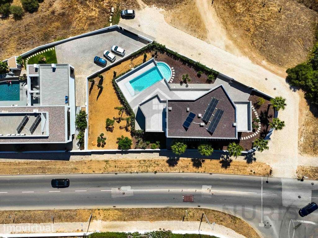 Moradia T4 de Luxo para Venda com Vista Mar e Piscina em Lagos - Grande imagem: 3/60