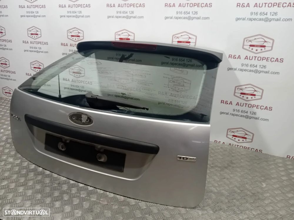 Tampa da Mala Ford Focus II Original - 2