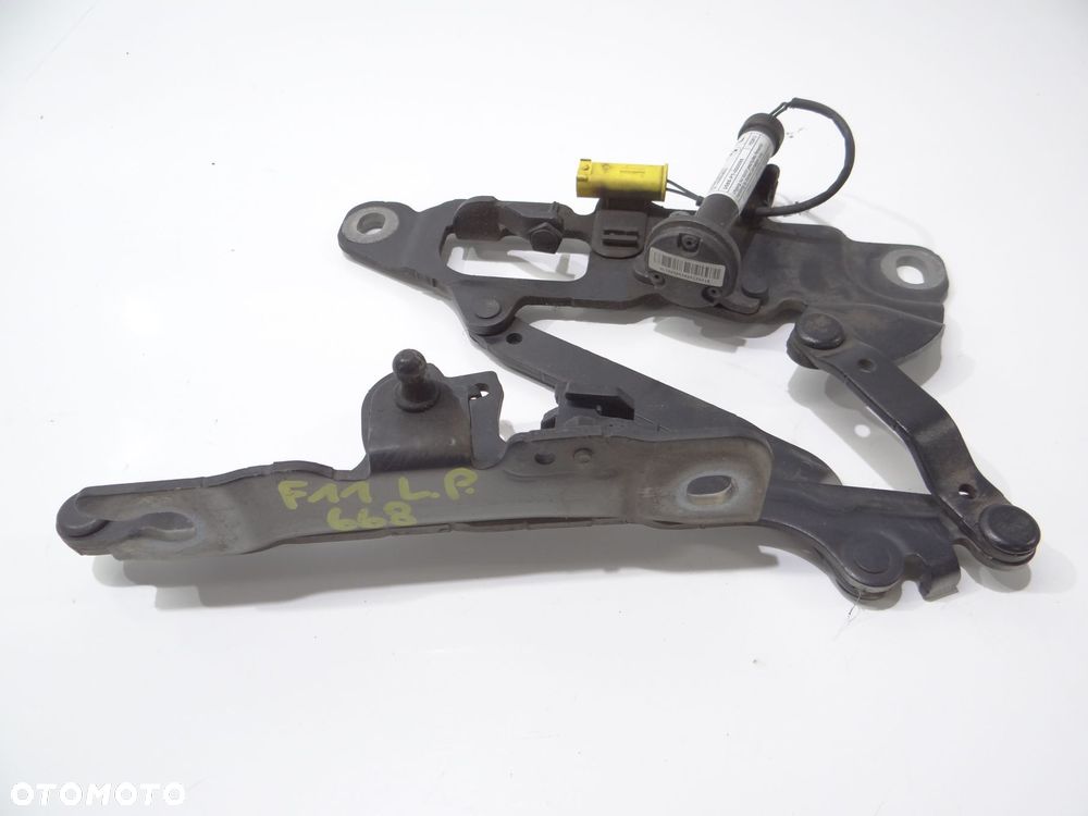 ZAWIAS MASKI NABÓJ LEWY PRZÓD BMW F11 7249887 668