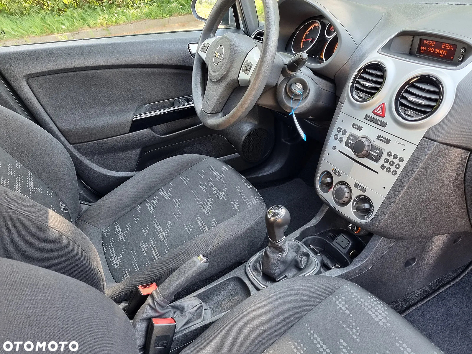 Opel Corsa 1.2 16V Enjoy - 11