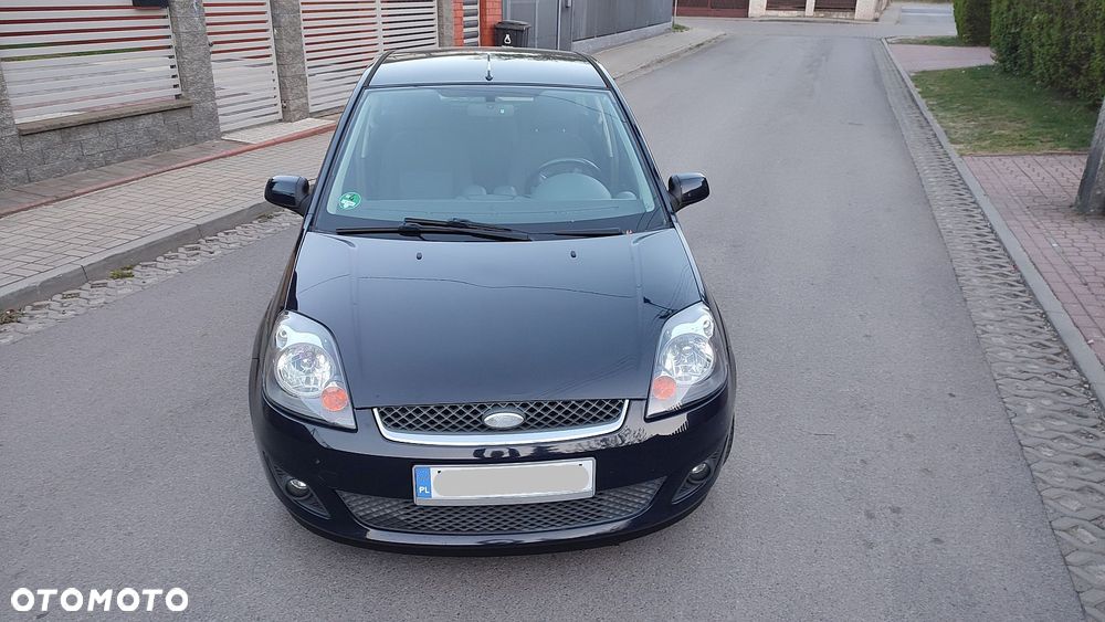 Ford Fiesta 1.4 Ghia - 31