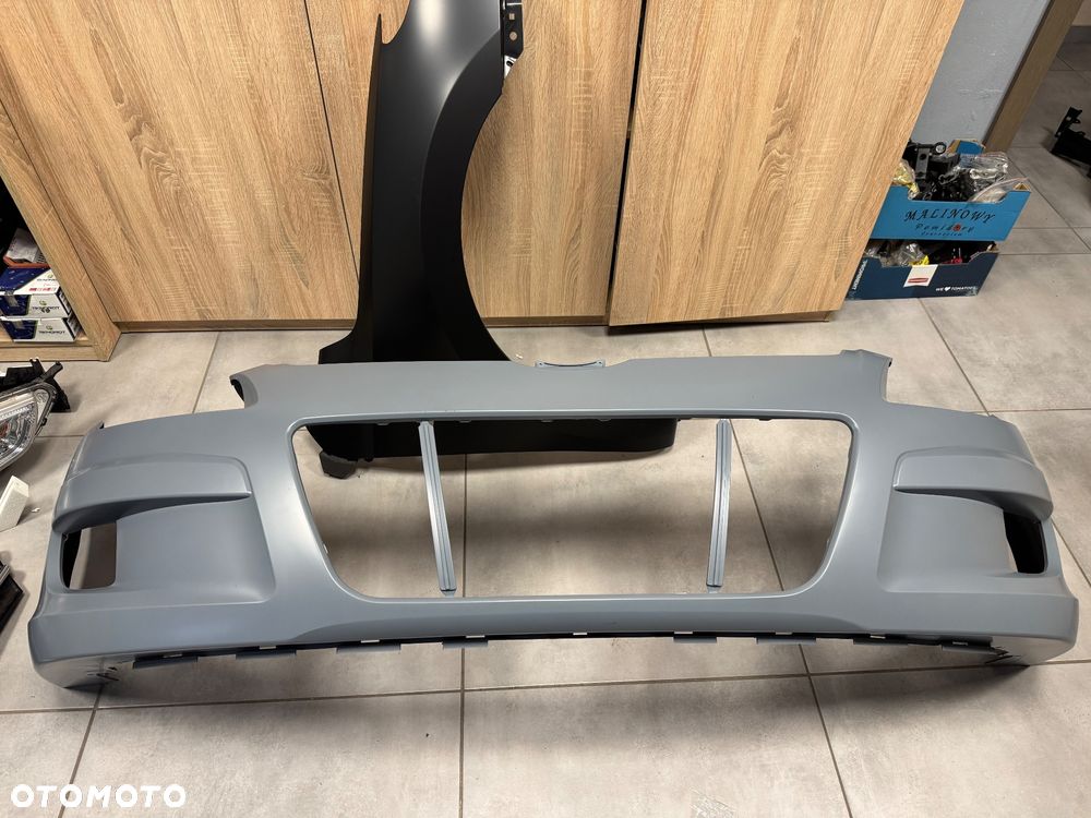 Hyundai i30 07- zderzak błotnik