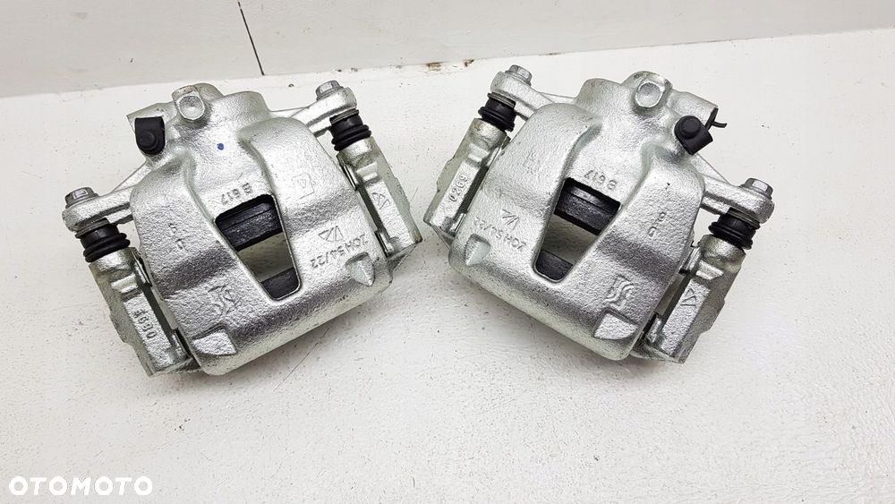 Zacisk jarzmo przód Opel Corsa D - 1