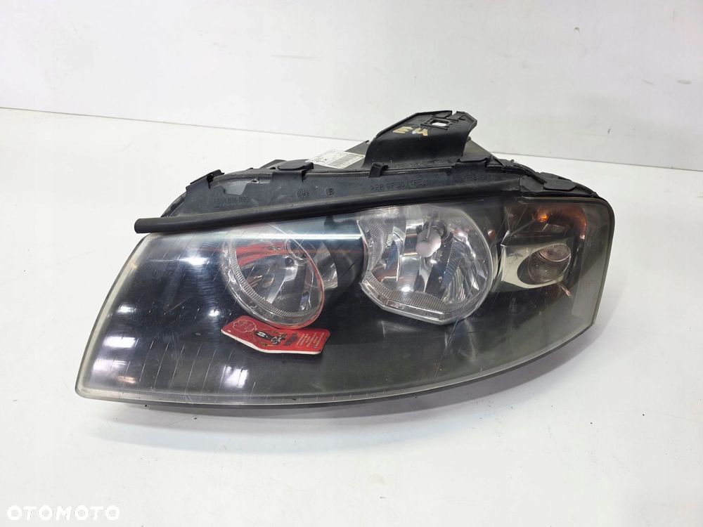 REFLEKTOR LAMPA LEWY PRZÓD EUROPA AUDI A3 8P DUŻY GRILL 8P0941003K 85/25 - 1