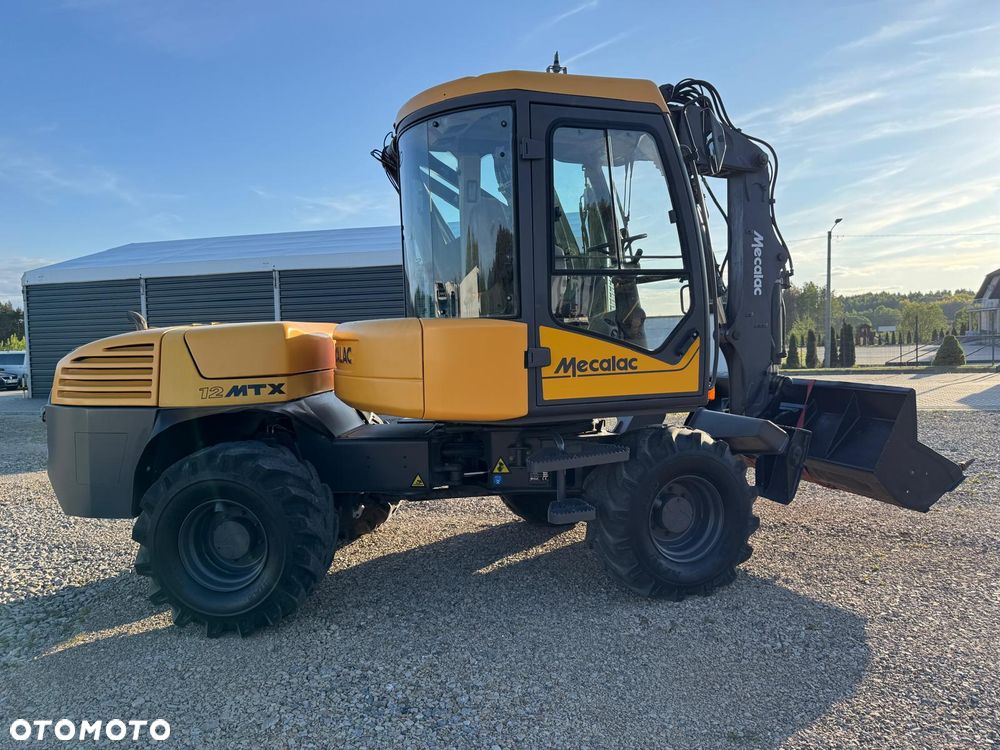 Mecalac 12 MTX 9260 kg Koparko Ładowarka - 24