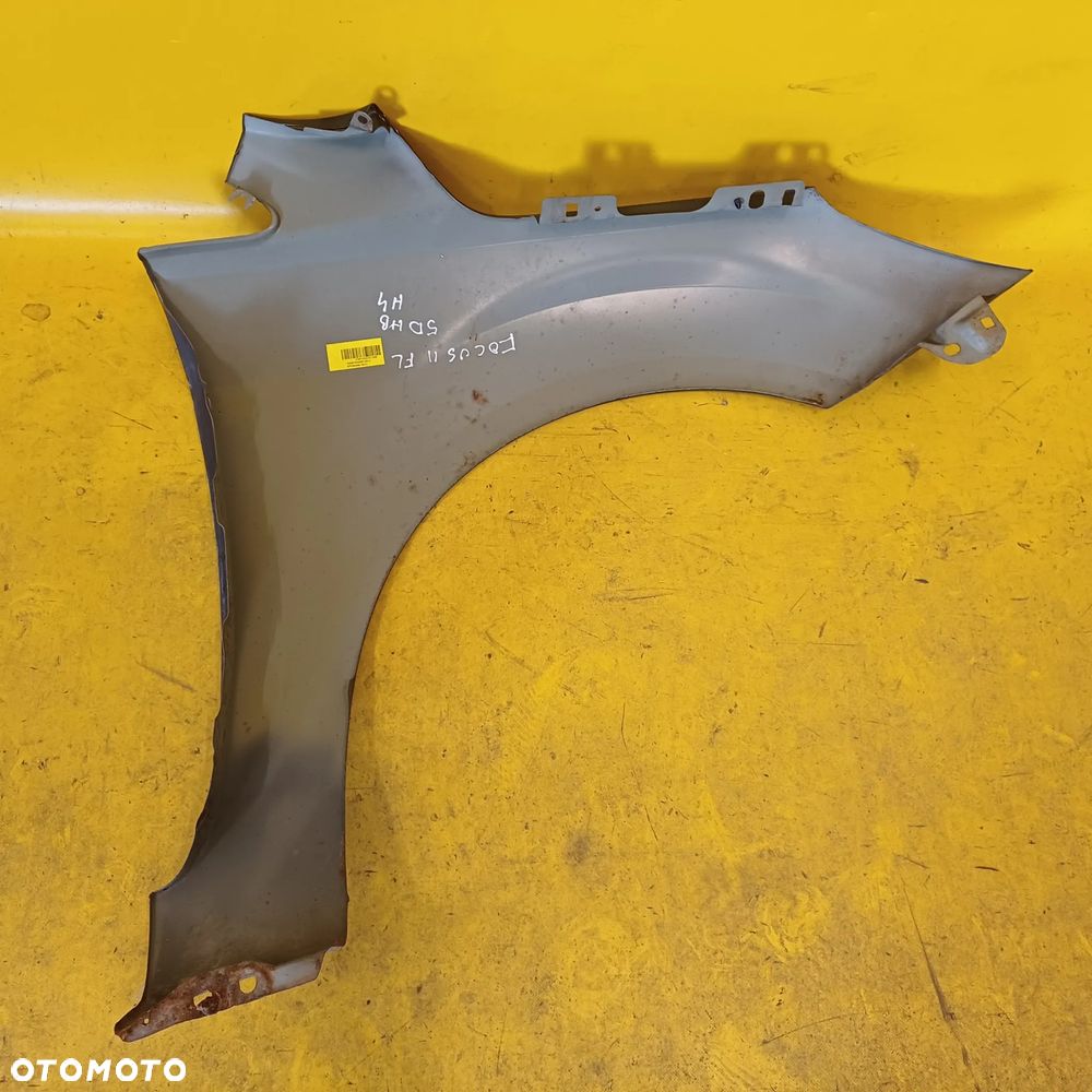 BŁOTNIK LEWY PRZÓD FORD FOCUS II LIFT KOMBI LAK: H4 NR709 - 11