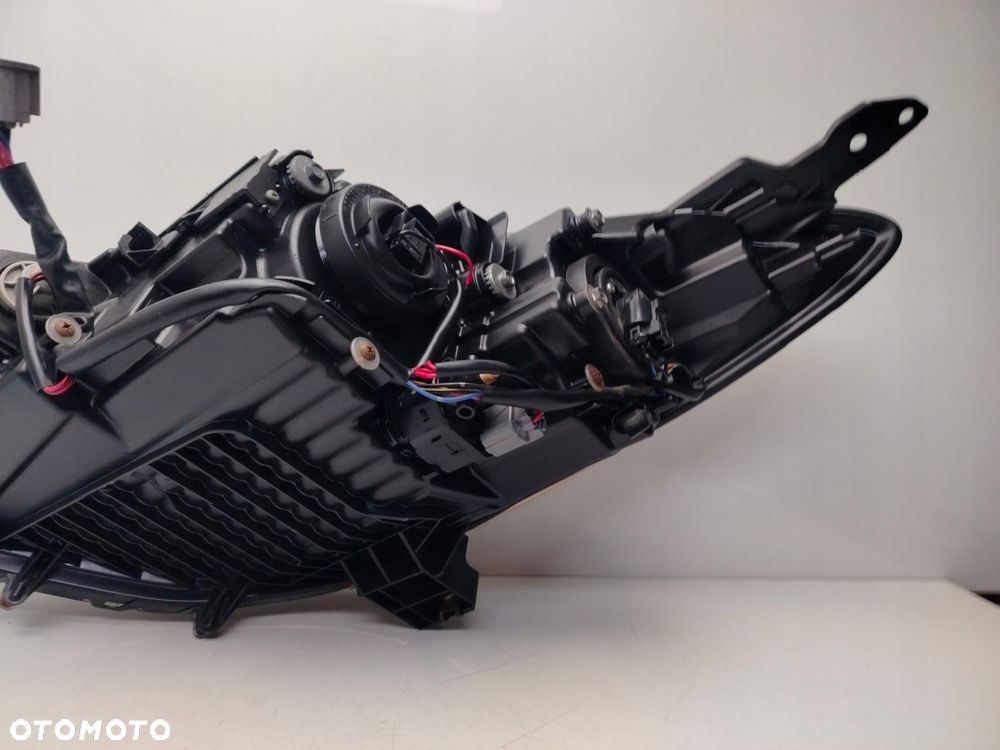mazda 2 de 2011r reflektor lampa prawy przód prawa przednia soczewka - 9