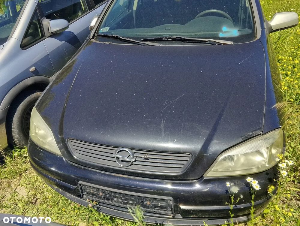 Opel Astra G (98-09r.) 1.6 B 74KM. Silnik X16SZR Skrzynia MG4 lakier 81L. Cały na części. GWARANCJA !!!  Przód Tył Zestaw Komplet Drzwi Klapa Zderzak Błotnik Maska Grill Atrapa Szyba Pas Lampa Lusterko Boczki Fotel Kanapa Kokpit Deska Rozdzielcza Przełącznik Włącznik Sterownik Przewody Wiązka Instalacja Moduł Komputer Czujnik Listwa Pompa Alternator Wtryski Głowica Rozrusznik Kompresor Sprzęgło Dwumas Silnik Skrzynia ABS Klimatyzacji Paliwa Wspomagania Kolektor Turbina Przepustnica Zawór Chłodnica Koło Hak Belka Sanki Zawieszenie Mcpherson Półoś Amortyzator Wydech Tłumik Zacisk Most - 4