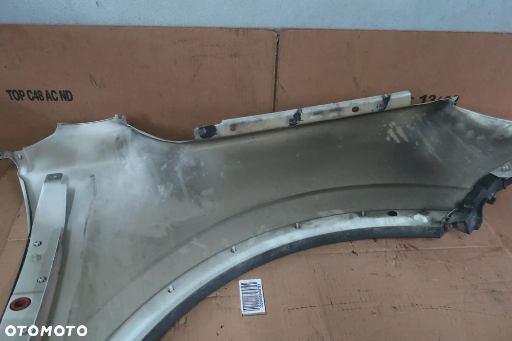 OPEL ANTARA BŁOTNIK LEWY PRZÓD GAZ 06-11R - 14