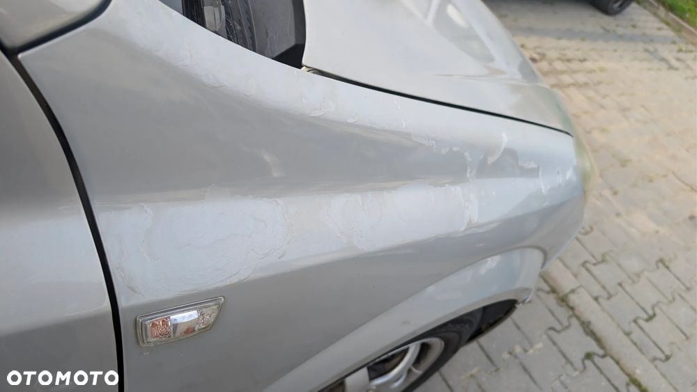 Opel Astra 1.8 Sport - 13