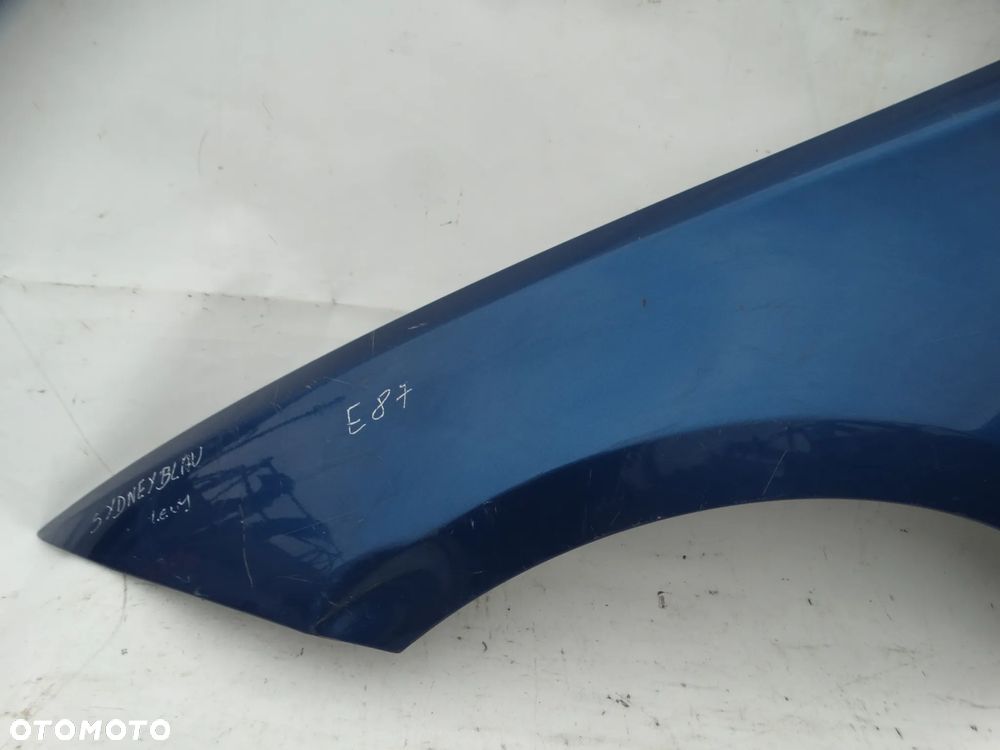 BŁOTNIK LEWY PRZÓD PRZEDNI BMW E81 E82 E87 E88 SYDNEYBLAU F-VAT - 2