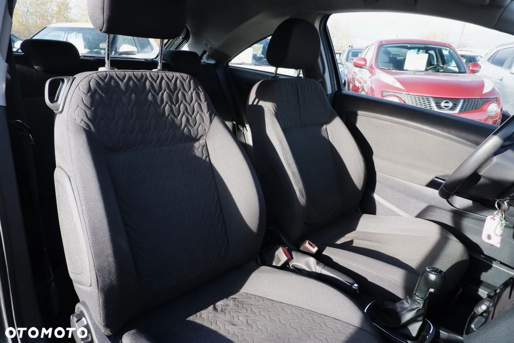 Opel Corsa 1.2 16V Enjoy - 10