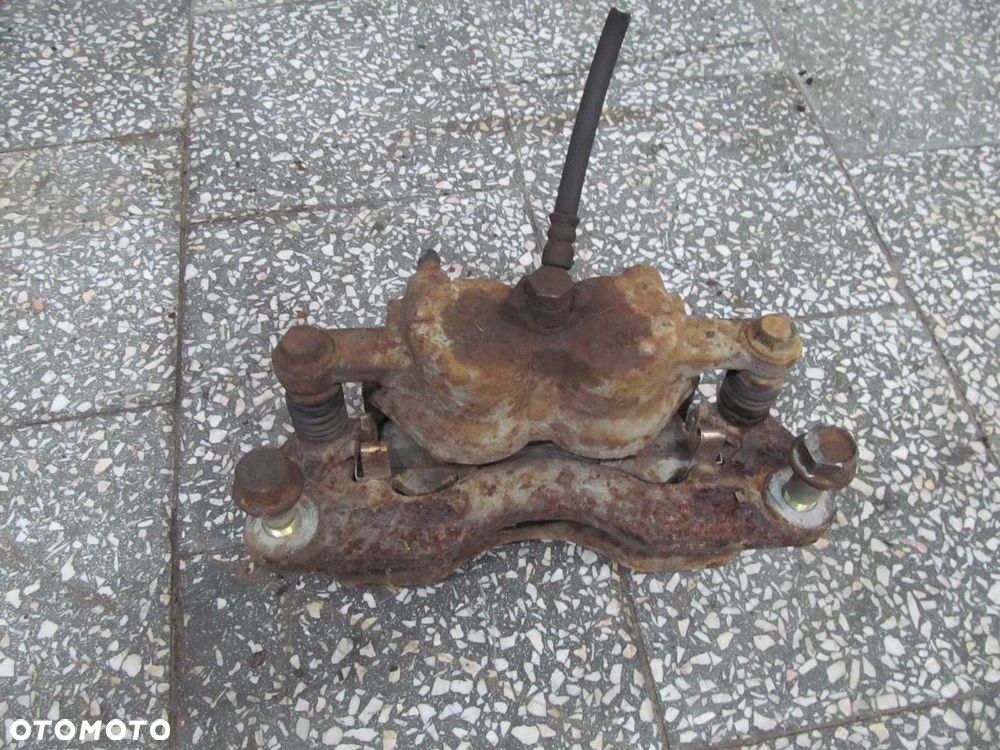 ISUZU N35 N GRAFTER NPR L ZACISK HAMULCOWY TYL PRAWY 07-18 - 4