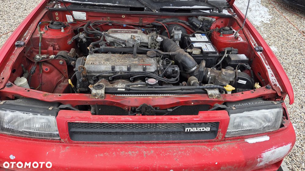 Mazda 323 - 12