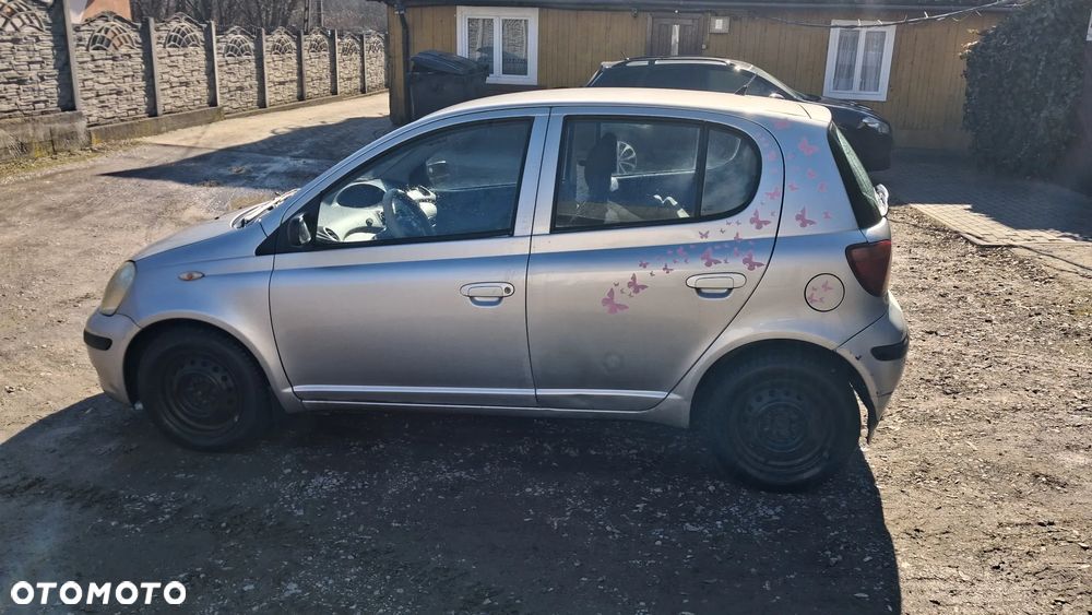 Na części Toyota Yaris I LIFT silnik 1.0 1SZ-FE , 1.3 VVY-i 2SZ-FE lakier 1E7 skrzynia maska zderzak drzwi klapa szyba fotel kanapa lusterko lampa - 6