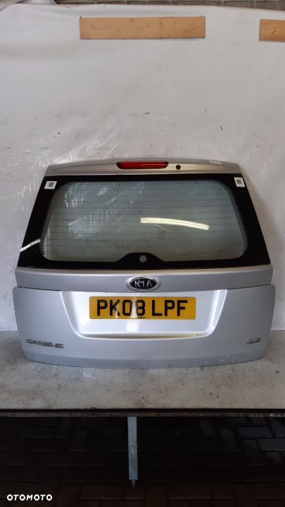 # KLAPA TYŁ TYLNA BAGAŻNIKA DO KIA CARENS 3 III SREBRNA S3 - 1