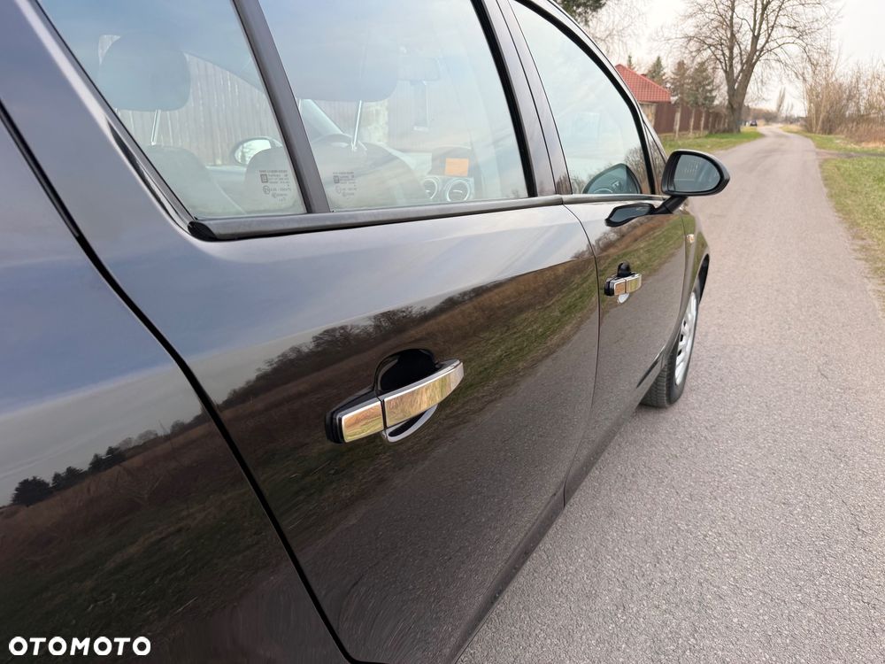 Opel Corsa 1.4 16V Active - 12