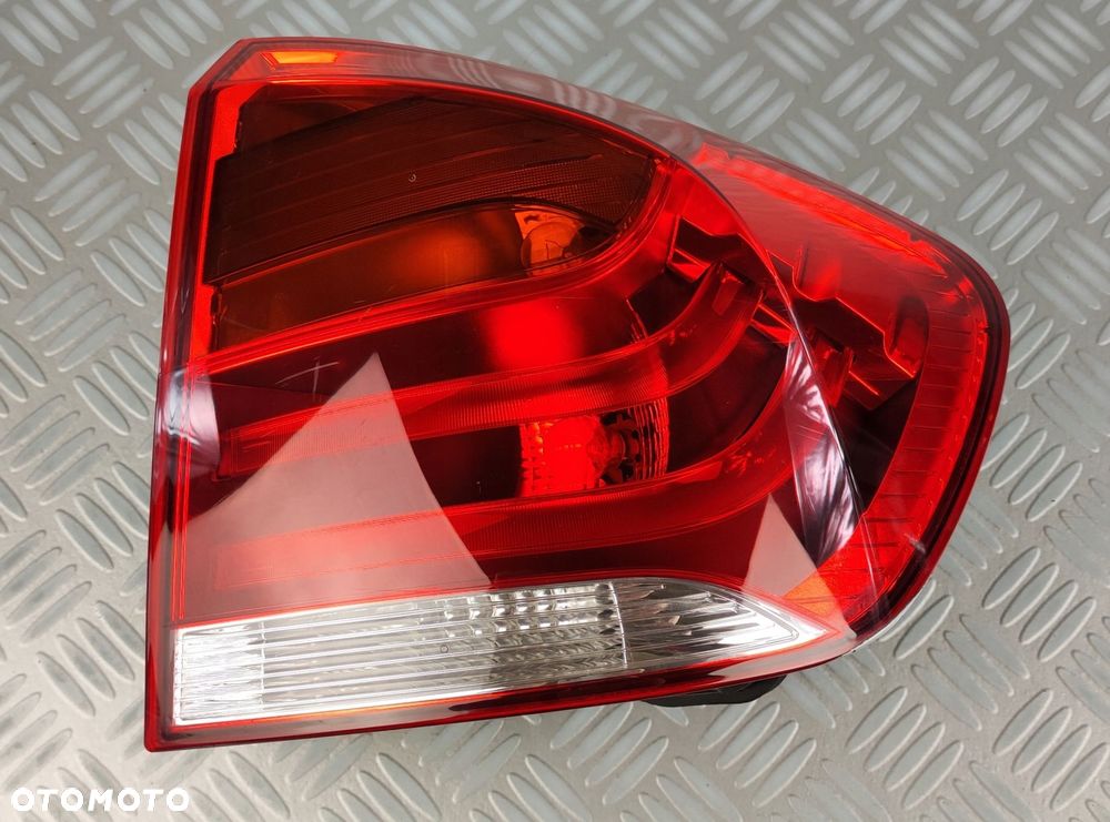 03.424.50 lampa prawa prawy tył tylna w błotnik BMW X1 E84 2009-2015 EUROPA - 6