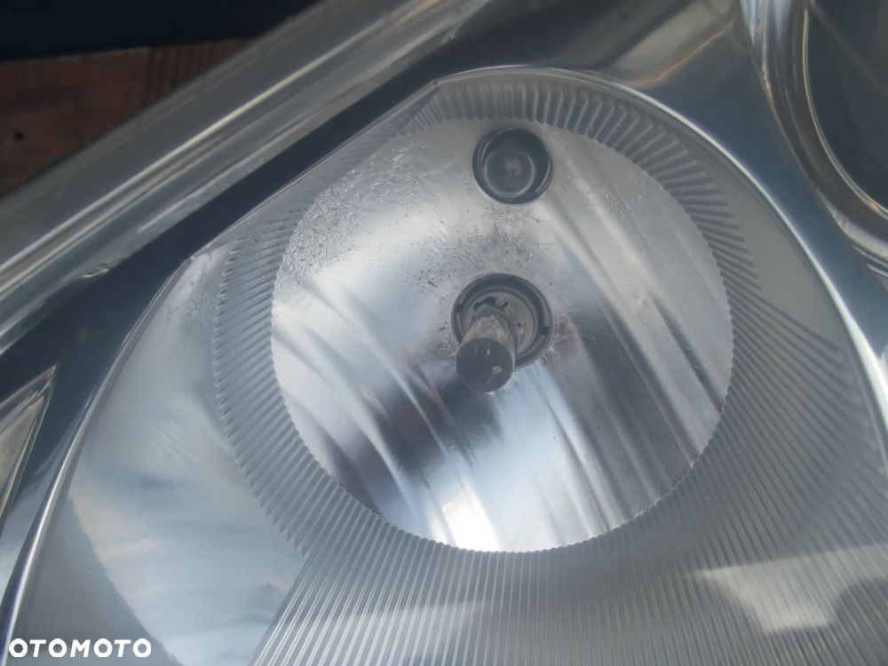 Lampa lewa VW PASSAT B5 LIFT HELLA EUROPA - 3