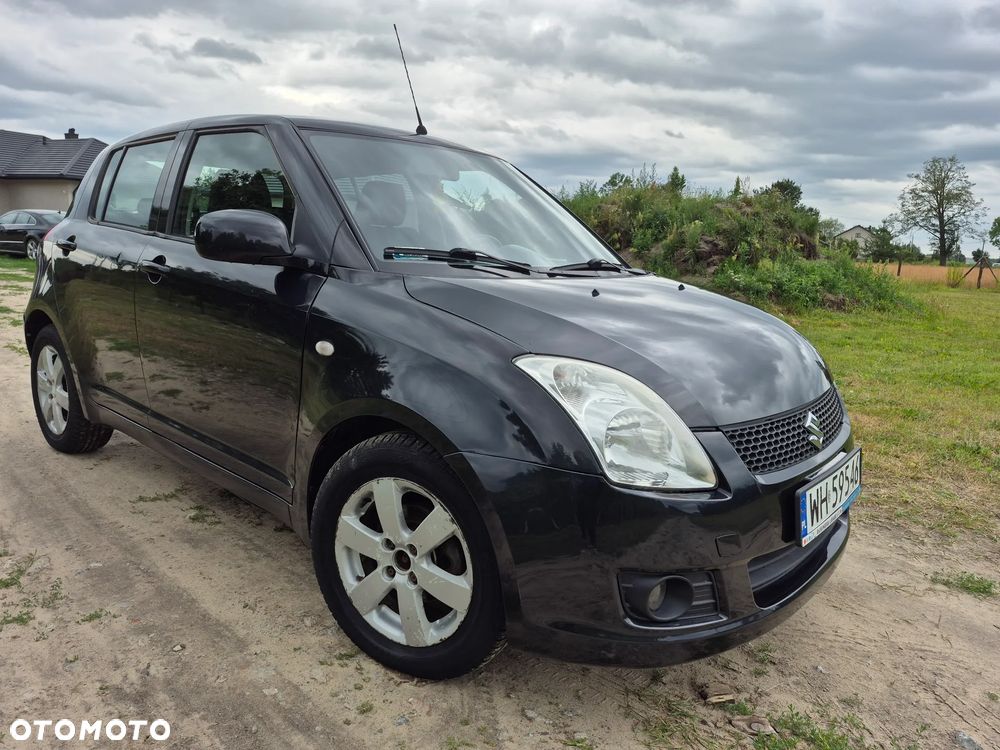 Suzuki Swift 1.3 Club - 4