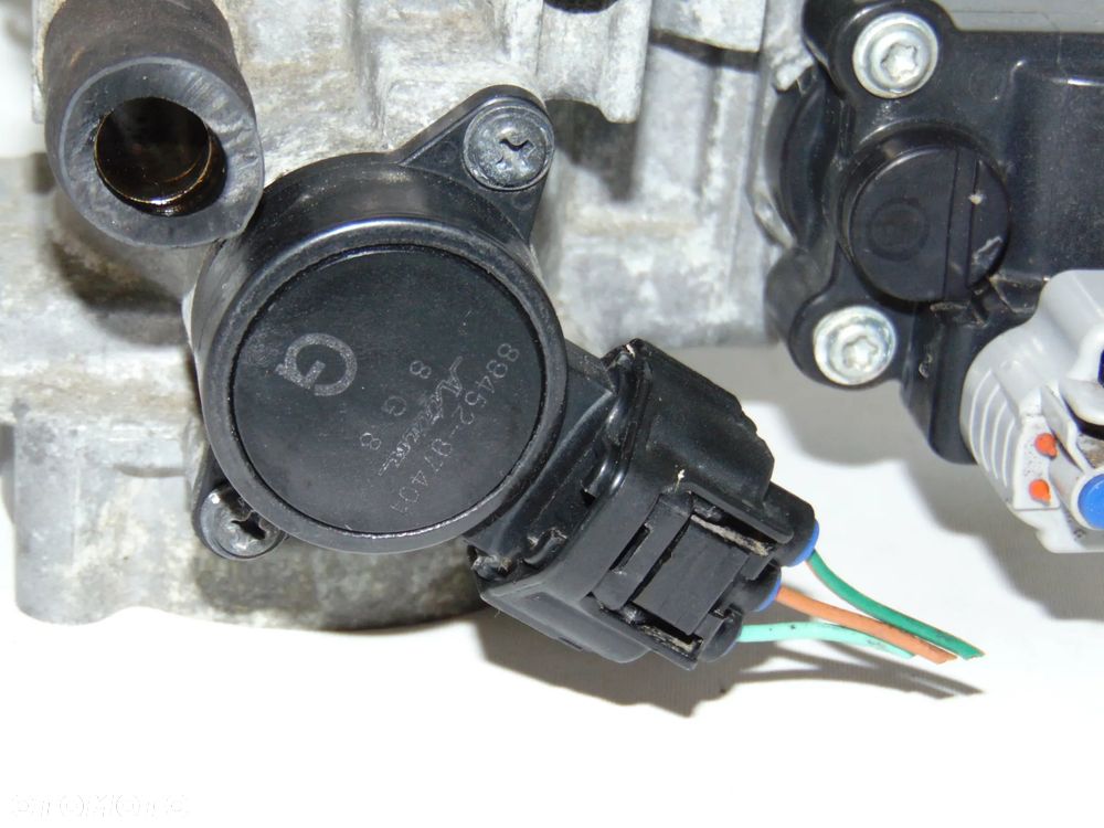 Przepustnica silniczek silnik krokowy potencjometr B1020BG08 22270-97401 89452-97401 Daihatsu Sirion 2 II 1.3 benzyna 04-08r - 12