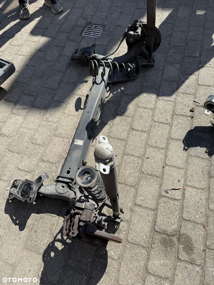 OŚ BELKA ZAWIESZENIE TYŁ 5Q0501049AF VW GOLF VII SPORTSVAN LEON 5F - 1