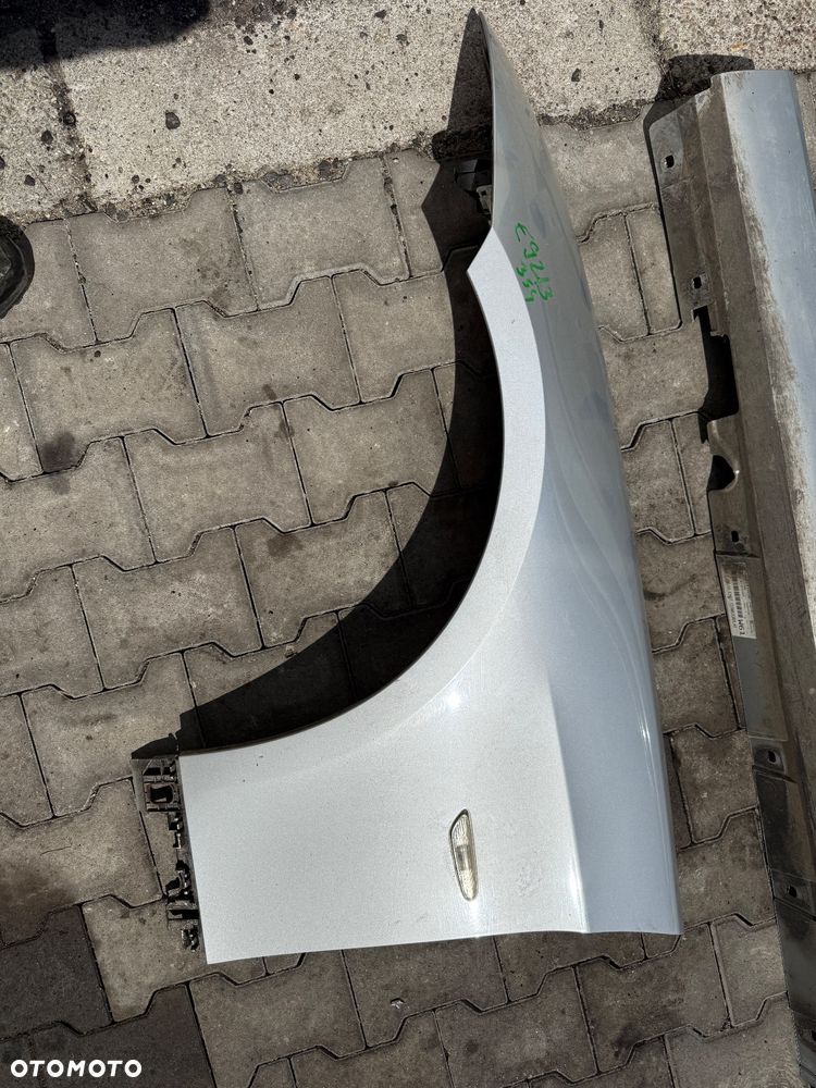 Błotnik lewy / prawy e92 e93 354 titansilber oryginalny