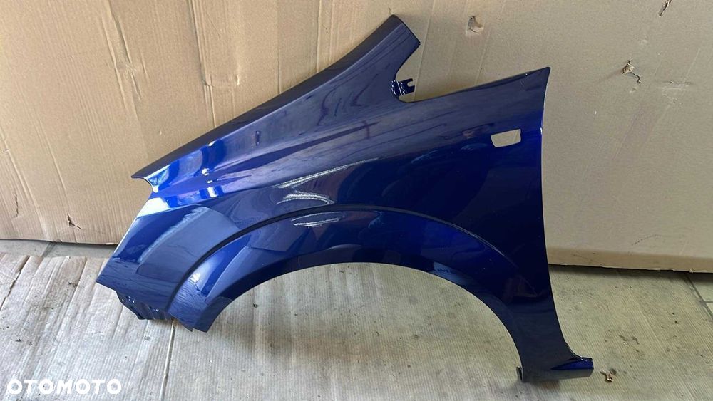 Opel Zafira Błotnik - Z21B - Ocynk/Nowy! Lewy - 1